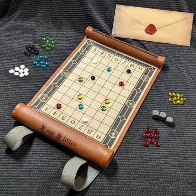 Sage Stones* A leather scroll with a grid on it and several colorful stones on it and around it with three dice and an envelope with a seal.