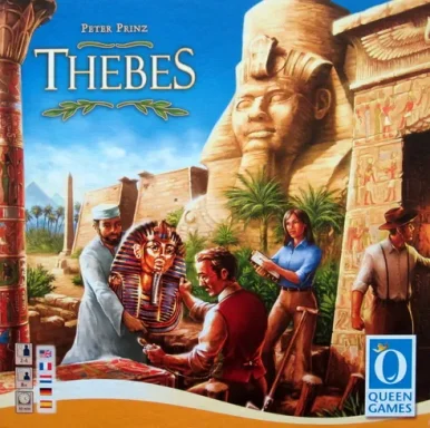 Thebes Archeologists remove a gold pharaoh bust from a doorway in front of a sphinx under the game title "Thebes"