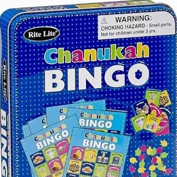 Chanukah Bingo A bingo game set with dreidel chips and bingo cards with Chanukah symbols in a blue box with white polka dots.